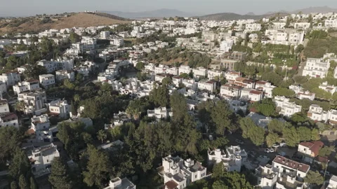 D-Log M. Bodrum, Turkey. Drone flight over white flat-roofed houses near Stock Footage 320150833