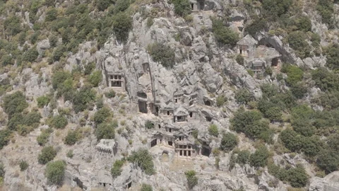 D-Log M. Demre, Turkey. Detailed close up of ancient Lycian rock-cut tombs Stock Footage 320860916