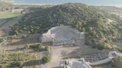 D-Log M. Gelemis, Turkey. Aerial view of Patara Ancient Theatre, Parliament Stock Footage 319987748
