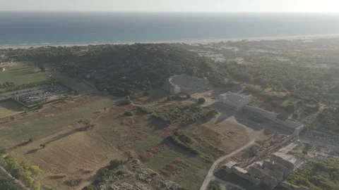 D-Log M. Gelemis, Turkey. Aerial view of Patara Ancient Theatre and Parliament Stock-Footage 320153752