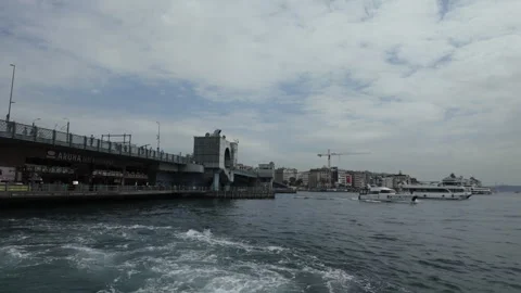 D-Log M. Istanbul, Turkey. Galata Bridge, its dual-level steel span crossing the Stock Footage 339764642