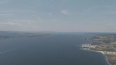 D-Log M. Lapseki, Turkey. 1915 Canakkale Bridge with cars on top and a cargo Stock Footage 317484269