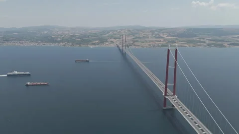 D-Log M. Lapseki, Turkey. Cars driving over 1915 Canakkale Bridge and a bulk Stock Footage 317485315