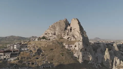 D-Log M. Uchisar, Nevsehir, Turkey. Aerial view of massive Uchisar Castle rock Stock Footage 330413060