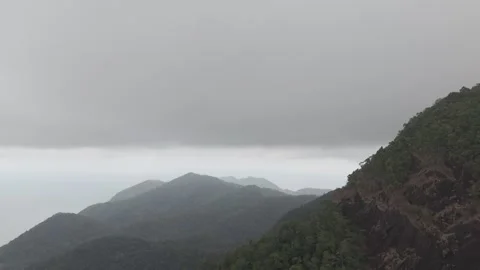 D-Log video. Clouds enveloping koh chang island in thailand Video stock 304654710