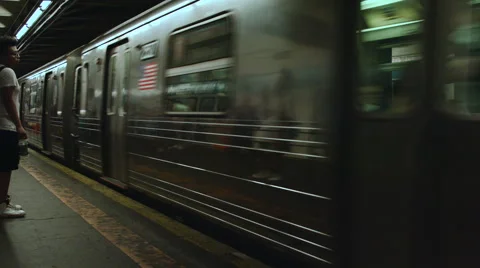 D subway train arriving at the station in New York City Stock-Footage 63655879