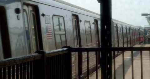 The D Train on the Elevated Subway Station in Bensonhurst Brooklyn Stock Footage 244680225