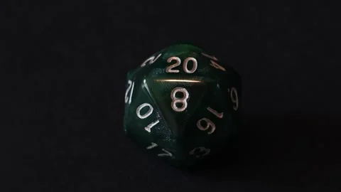 A D20 with light reflecting off of it Stock Footage 335944845