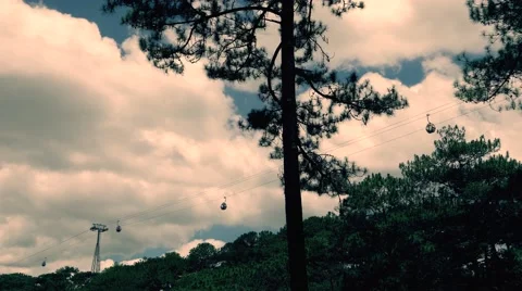 Da Lat - May 2015: Cable car above pine forest. Retro look. 4K resolution. Stock Footage 51111979