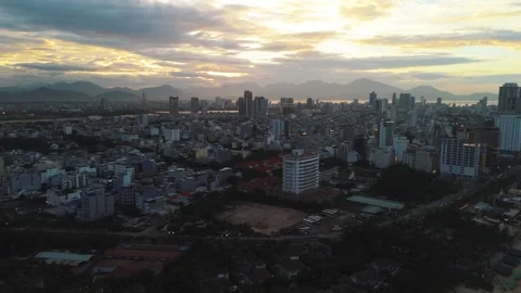 Da nang cityscape aerial view at sunset, capturing the dramatic twilight sky Stock Footage 340548341