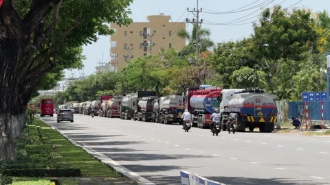Da Nang, Vietnam - August 12, 2026: Fuel Tanker Trucks Queue During Gasoline Stock-Footage 343331053