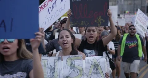 DACA supporters march from Echo Park Lake to Olvera in downtown Los Angeles, Stock Footage 81574812