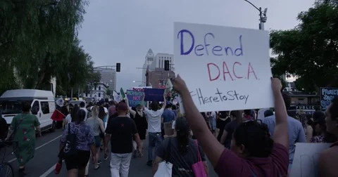 DACA supporters march from Echo Park Lake to Olvera in downtown Los Angeles, Stock Footage 81574858