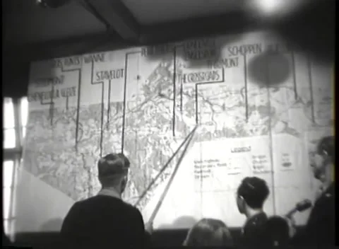 DACHAU - 1946: Malmedy trial — Pointer rests below THE CROSSROADS Stock Footage 343543200