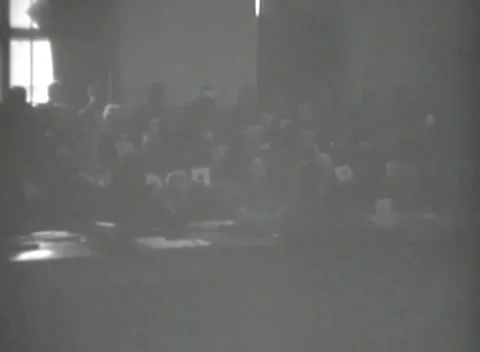 DACHAU, GERMANY - 1947: Document table - Pale cards fill seating tiers Stock Footage 344490771