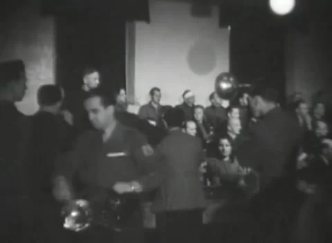 DACHAU, GERMANY - 1947: Flash reflector - Press cameras cover courtroom floor Stock Footage 344490822