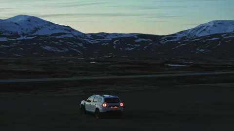 Dacia Duster with mountains in the background Stock Footage 273167998