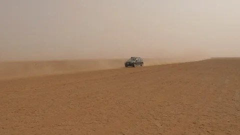 Dacia Duster runs fast in Erg Chegaga desert, Morocco, Africa in 4K Stock Footage 92150124