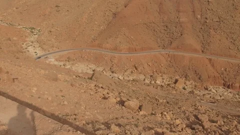 Dacia Duster runs in Marocco hinterland, arid landscape, Morocco, Africa in 4K Stock Footage 91831533
