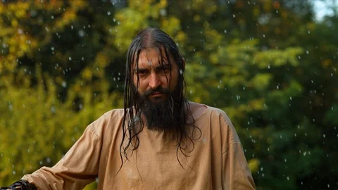 Dacian warrior under the rain, slow motion Stock Footage 86460048