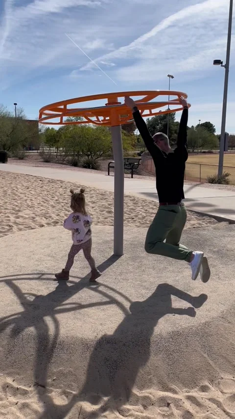 Dad Accidently Knocks Daughter Over, Tempe, Arizona, USA - 27 Feb 2022 Stock Footage 205423482