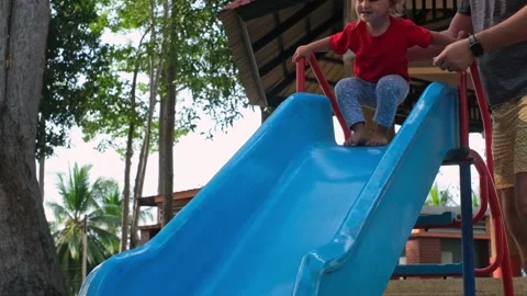 Dad and child on the slide Stock Footage 170535121