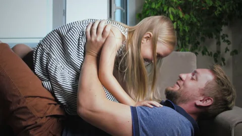 Dad and daughters laugh Stock Footage 132401609