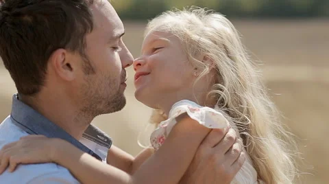 Dad and little daughter hugging and kiss... | Stock Video | Pond5 