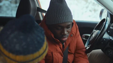 Dad and Son Discussing Route when Looking at It on Map on Tablet Stock Footage 249808596