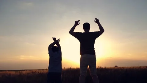 Dad and son playing outside Stock Footage 202525458