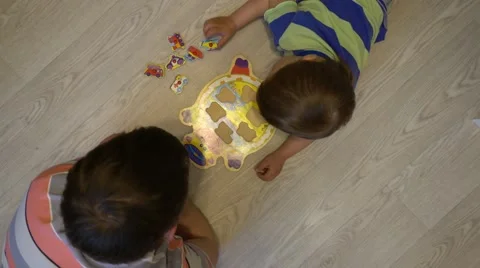 Dad and son playing in the puzzle. Transport. Stock Footage 63141198