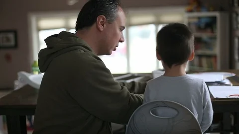 Dad and son reading together Видео 87997456
