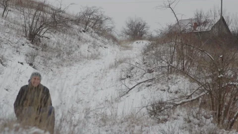 Dad and son sledding Stock Footage 301508608