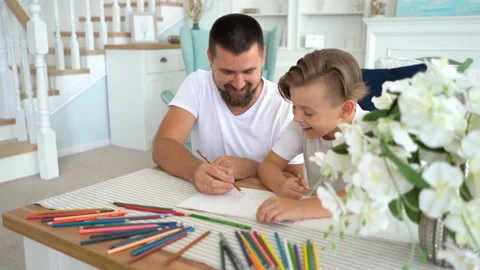 Dad and son spend time together. They laugh and play cheerfully. Stock Footage 115090662