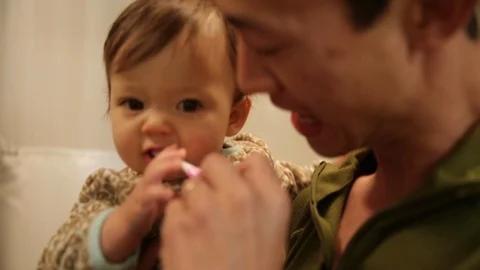 Dad Brushing Babys Teeth Before Bedtime Stock Footage 90262203