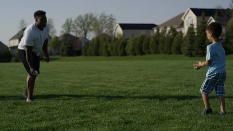 Dad celebrates son's first game of catch Video stock 89904805