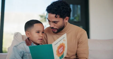 Dad, child and reading card at house for fathers day, celebration and parent Stock Footage 335189813