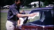 Dad Is Cleaning The Windows On The New Car 1950S Vintage Film Home Movie 1173 Stock Footage