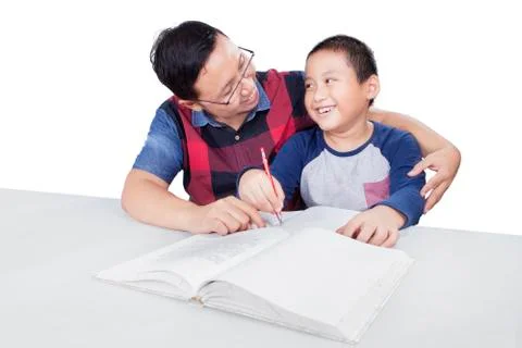 Dad guide his son to study 写真素材
