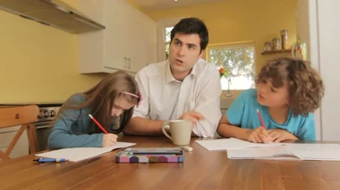 Dad helping with homework Stock Footage 22664090