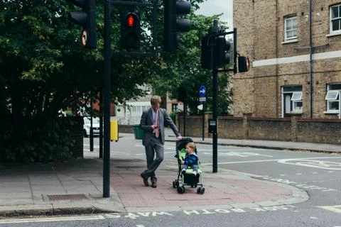 Dad with his son in a stroller 스톡 사진