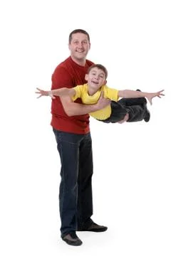 Dad keeps his son in his arms Stock Photos