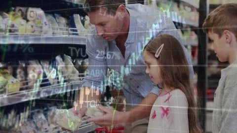 Dad leaning and pointing at fridge shelf, comparing prices as finance charts Stock Footage 331404343