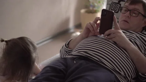 Dad with phone Stock Footage 153964410