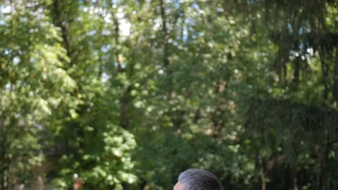 Dad playing with his son, throws him up and catch him. 4k. Slow Motion. Stock-Footage 97783763