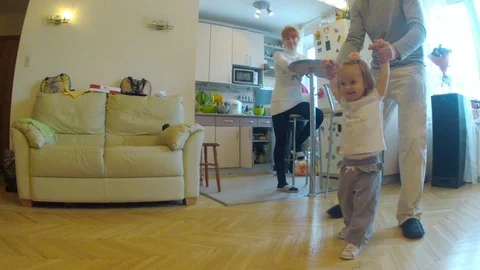 Dad plays catch with his daughter in the living room Stock Footage 69819086