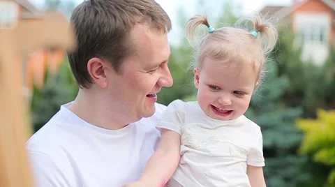 Dad plays with a daughter Stock Footage 64588461