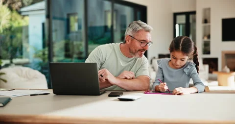 Dad, remote work and child with homework in home, multitasking or accountant Stock Footage 335515154