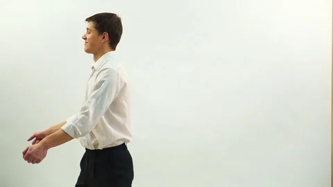 Dad represent how he puts the cookies in the oven and closes it Stock Footage 72719824