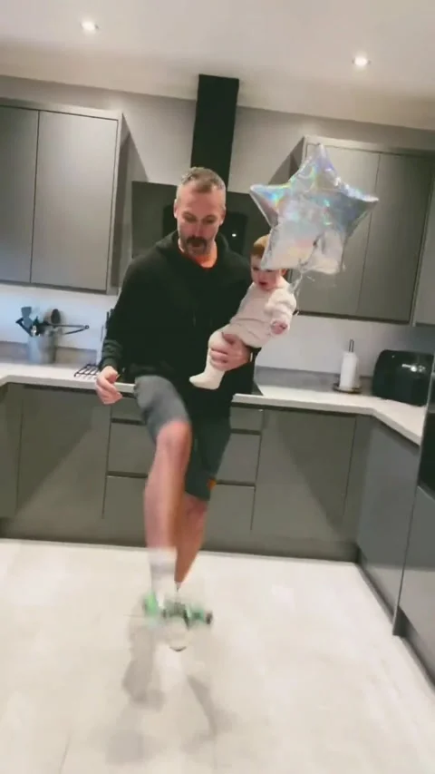 Dad Skillfully Catches Things With His Feet, Wales, UK - 04 Dec 2023 Stock Footage 265329933